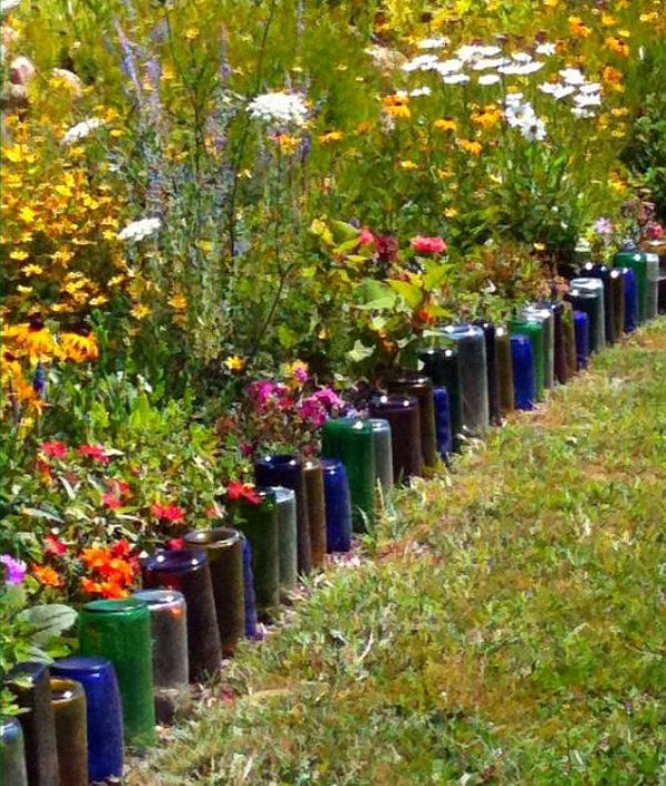 Recycle old wine bottles to create a garden edge