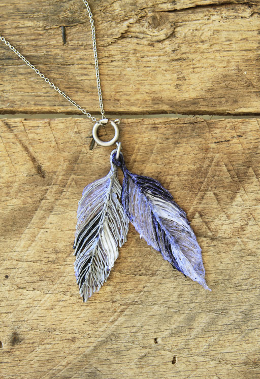 Plastic "doodle" feather necklace
