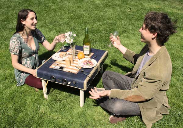 Suitcase picnic table with built in speakers