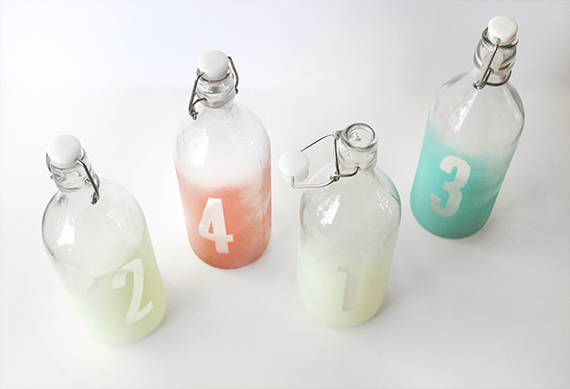 Colour etched glass bottles