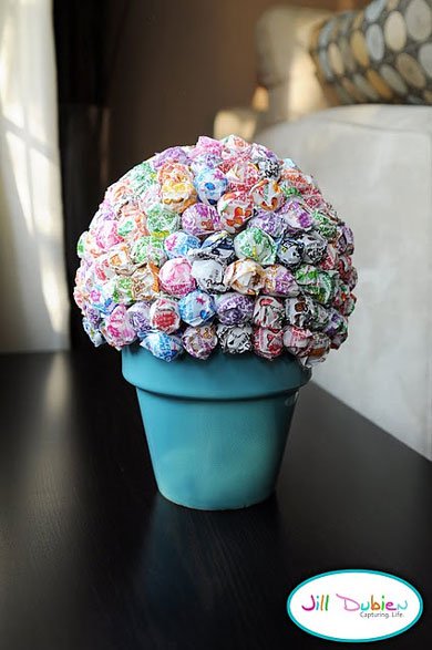 Potted lollipop tree 15 Creative Candy Bouquets That Will Make Your Mouth Water