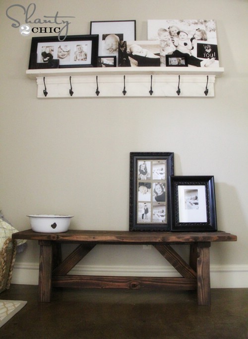 Stained, rustic wooden entryway bench