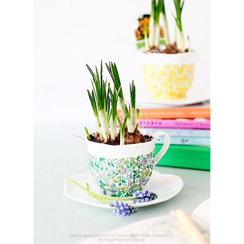 Decoupaged spring teacup planters 15 Crafts That are Perfect for Your Farm House