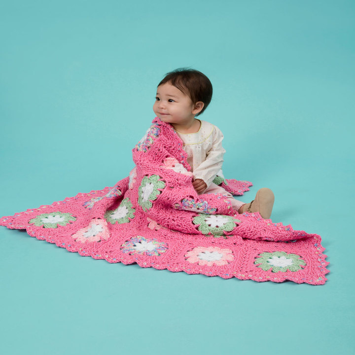 diy flower baby crochet blanket 19 Crocheted Baby Blankets To Warm Up Those Little Feet