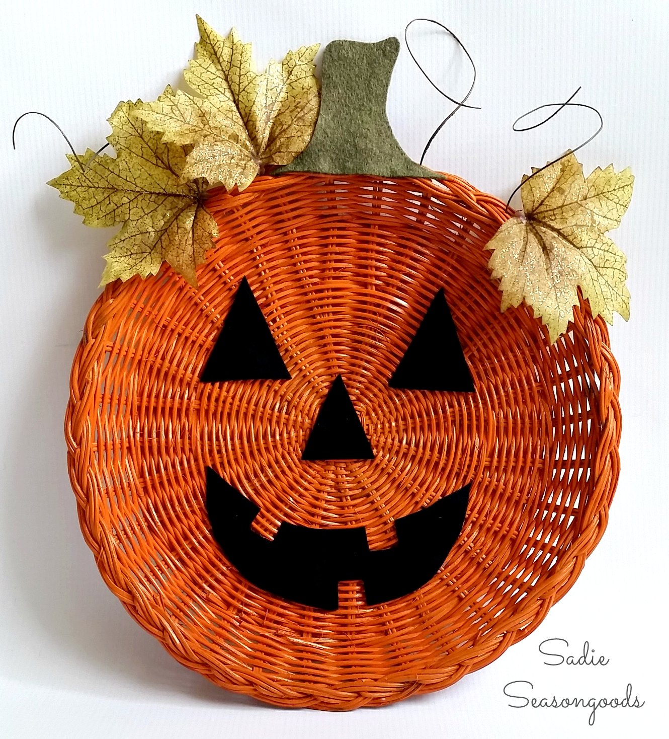 Wicker rattan charger paper plate holder pumpkin jack o lantern door hanger halloween sadie seasongoods