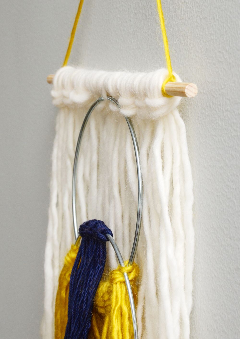 Easy yarn tassel wall hanging scale