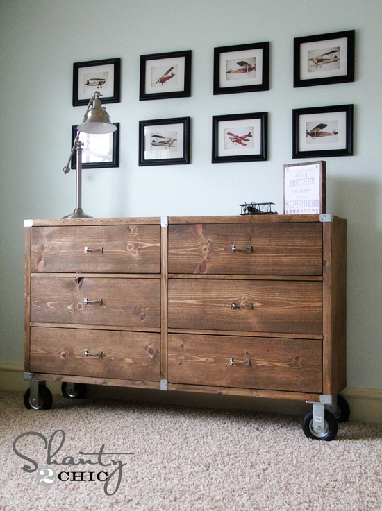Rustic wooden dresser with wheels