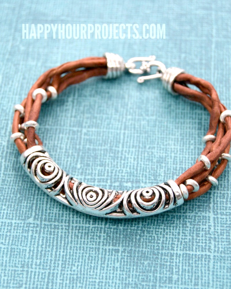 Silk and silver layered tube bead bracelet
