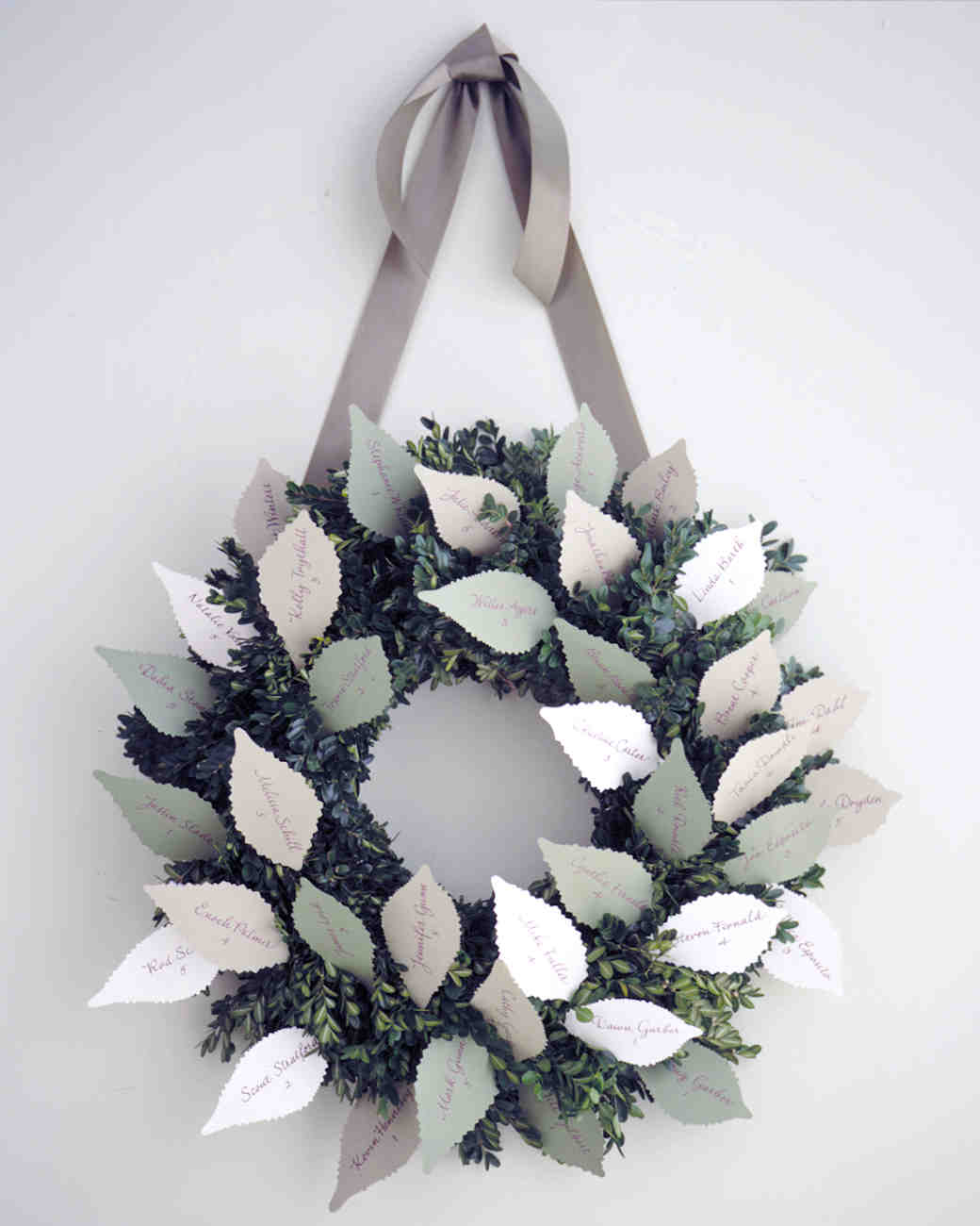 diy winter wedding ideas escortcard wreath 50 Christmas Wedding Ideas That Are Both Festive and Stylish!