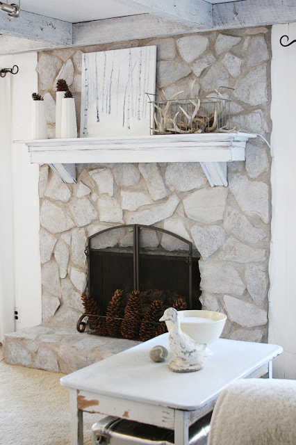 Antler and birch painting mantel