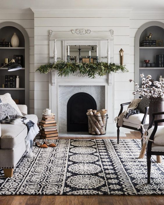 winter mantel greenery and taper candles 25 Winter Fireplace Mantel Decorating Ideas