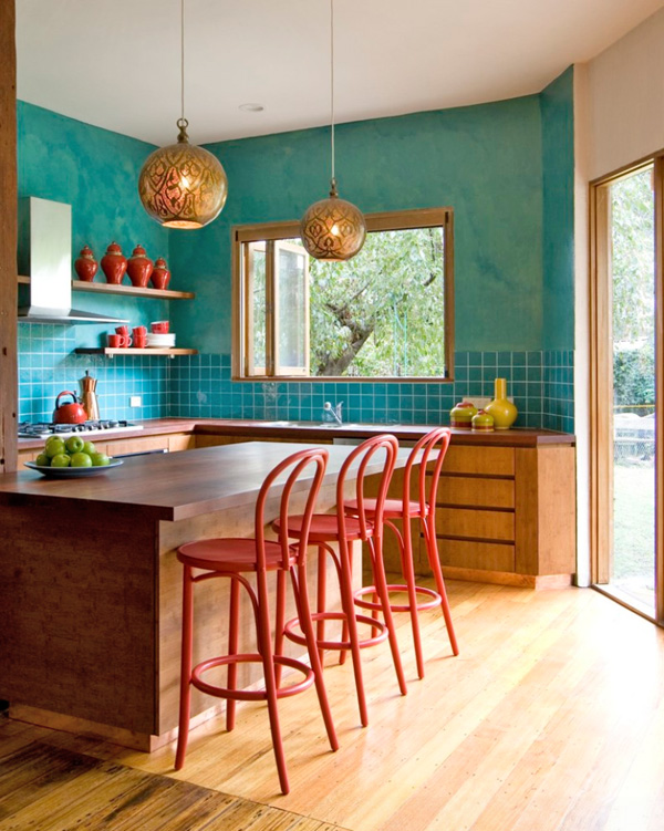 Colorful tiled kitchen red stool