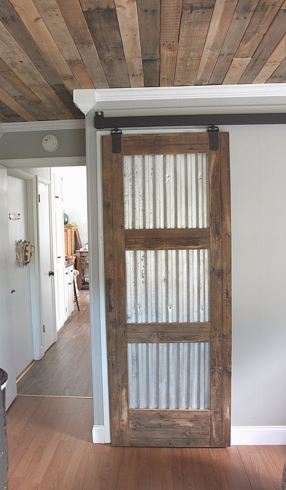 DIY Barn Doors Totally Transform Enclosed Patio