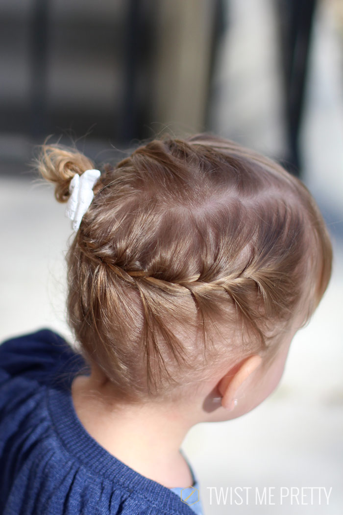 Braided side bun toddler hairstyle