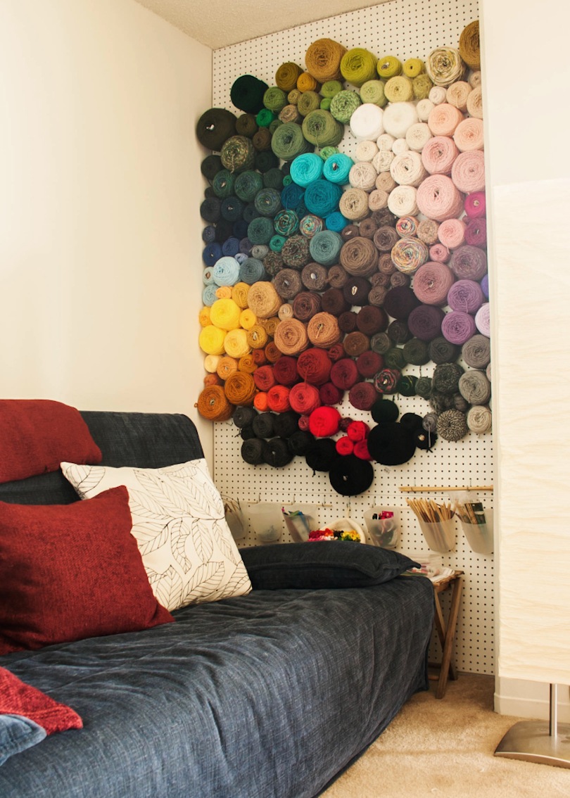 Peg board yarn wall DIY Yarn Storage Ideas