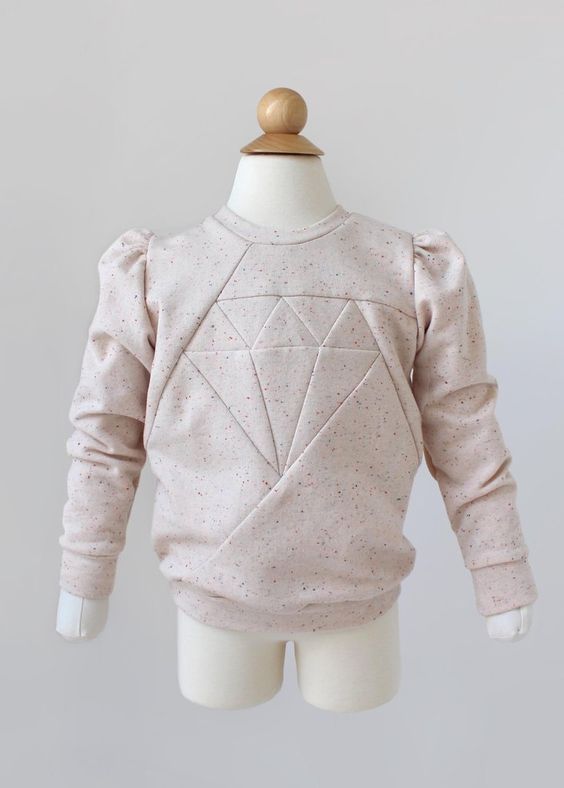 Geometric sweatshirt with ruffled shoulders