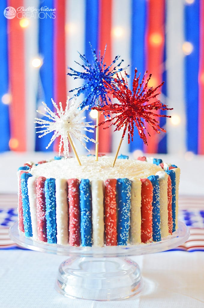 Amazing 4th of july cake with fireworks and red white and blue sparkle pretzels so fun1