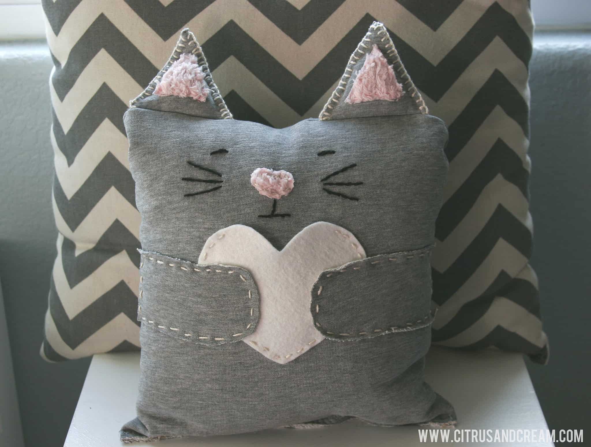 Cat pillows with ears and hearts
