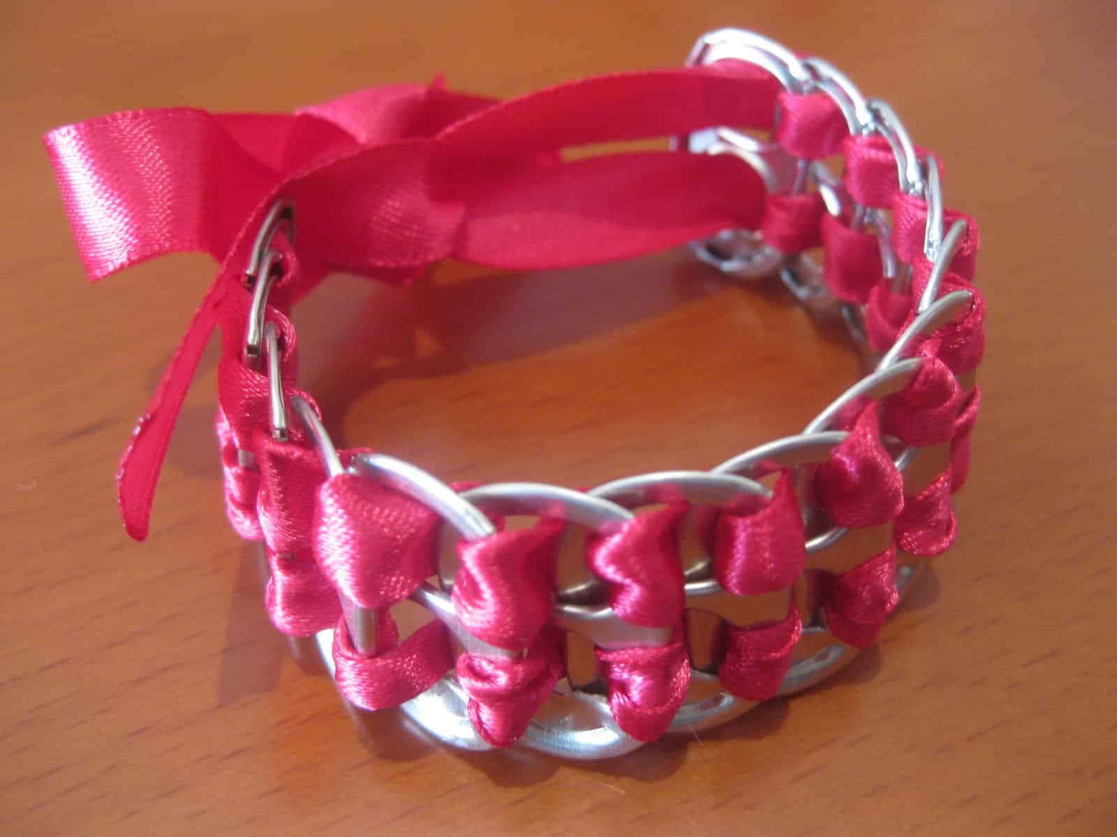 Pop tab bracelet with woven ribbons
