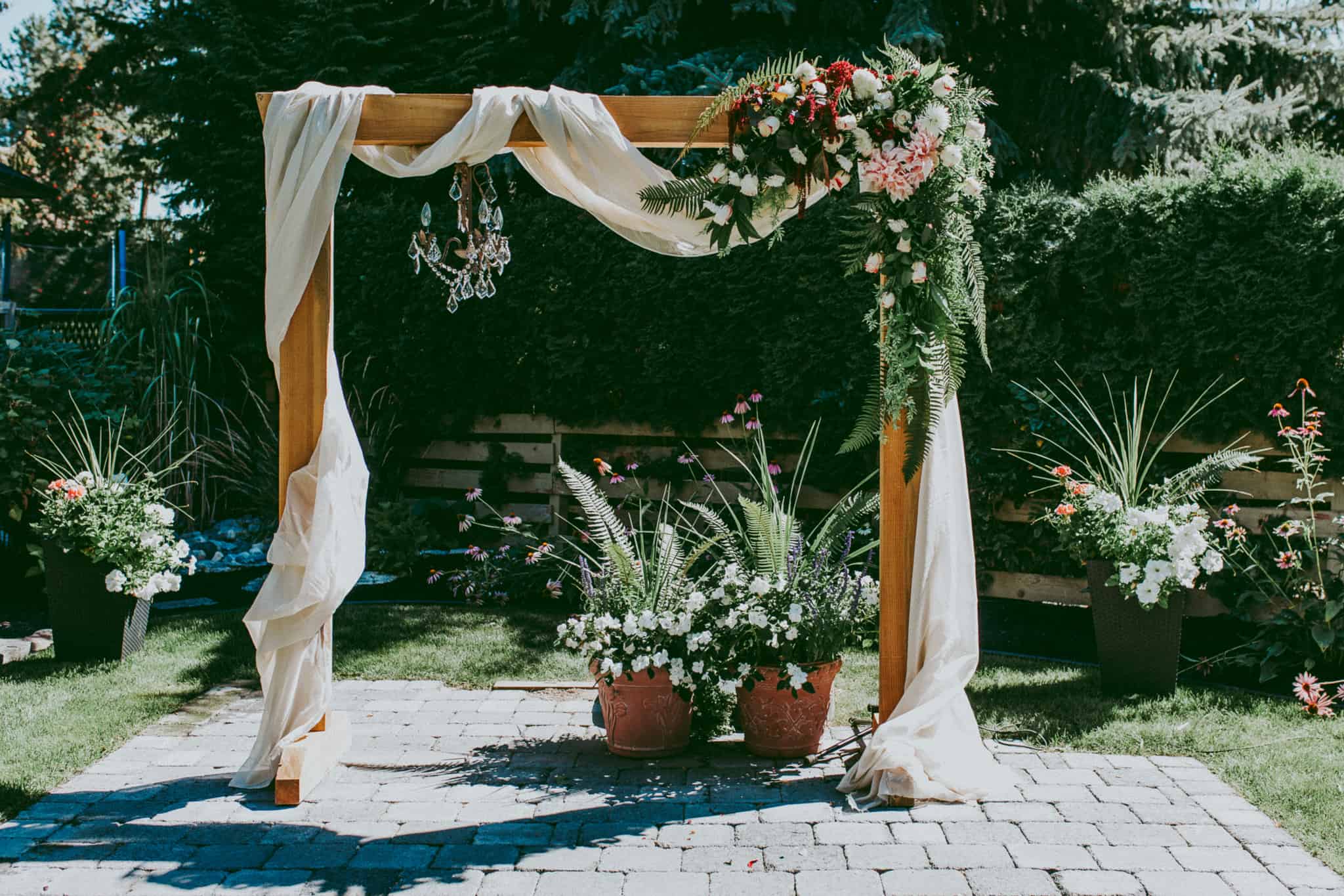 With Fabric and flowers wedding arch diy 1