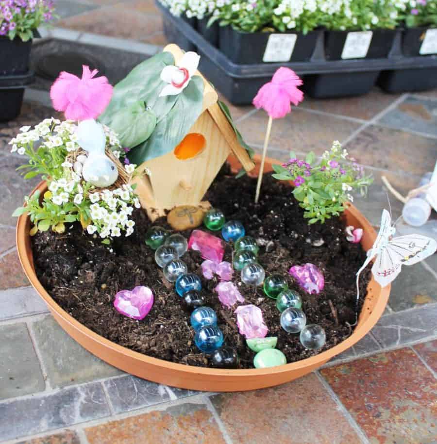 Kids enjoy making fairy gardens diy