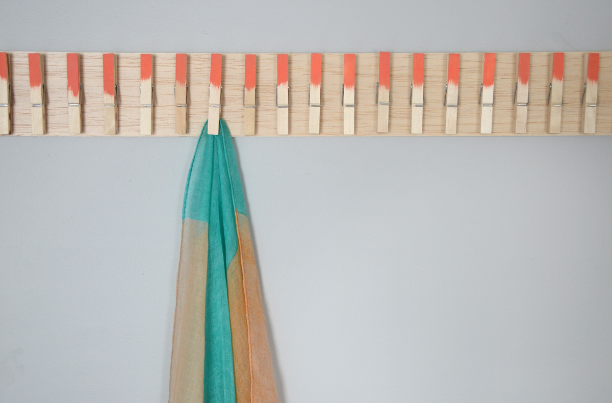 Stylish clothespin scarf hanger