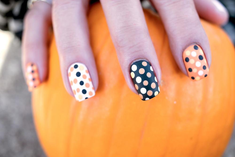 Polka dots black and orange nails