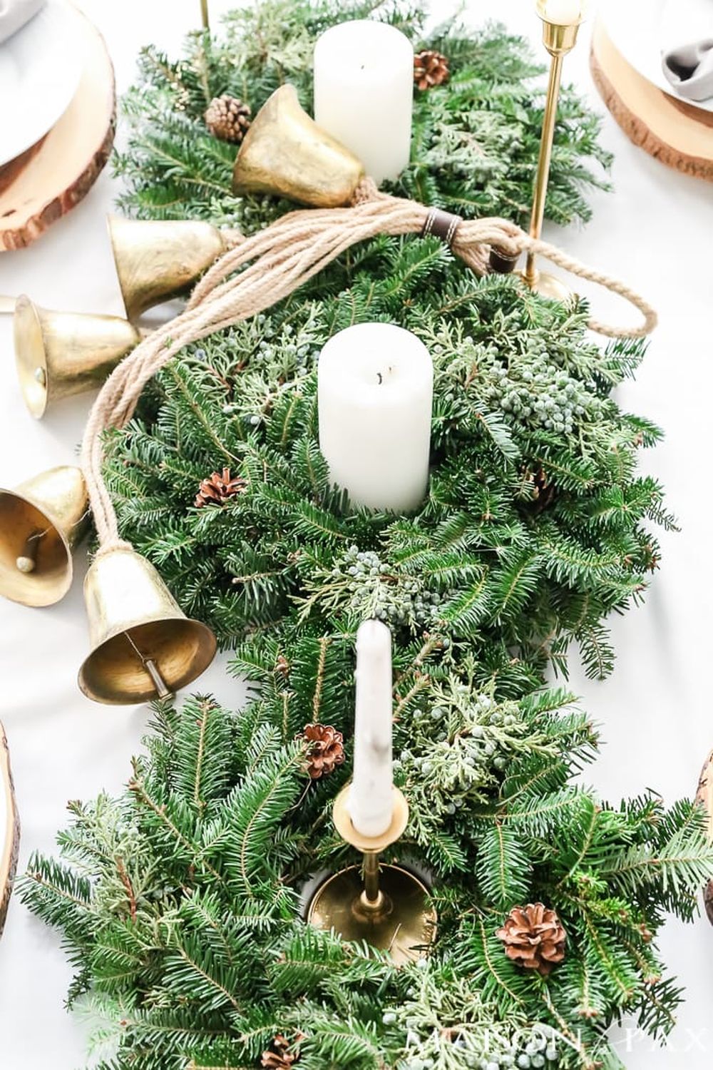 Wreath table runner with bells christmas tablescape ideas 