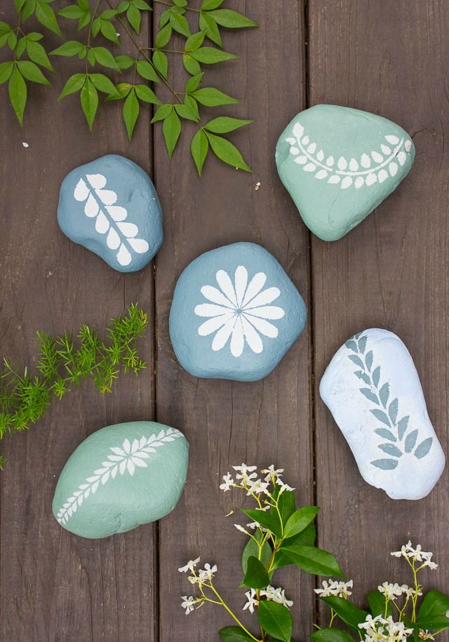 Chalk paint stenciled garden rocks - Spring Porch Decor