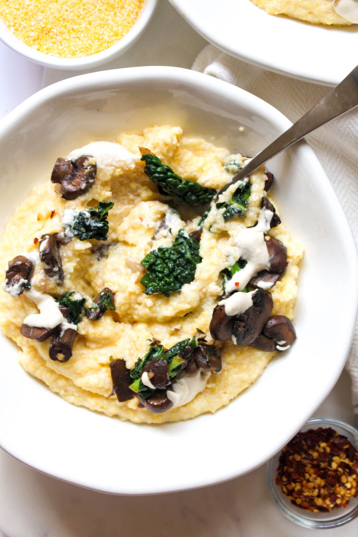 Polenta with mushroom ragout and dairy free cream sauce eating