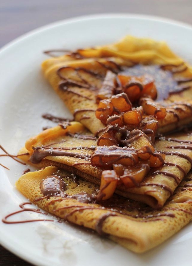 Pumpking crepes with beer, cinnamon apple, and chocolate drizzle
