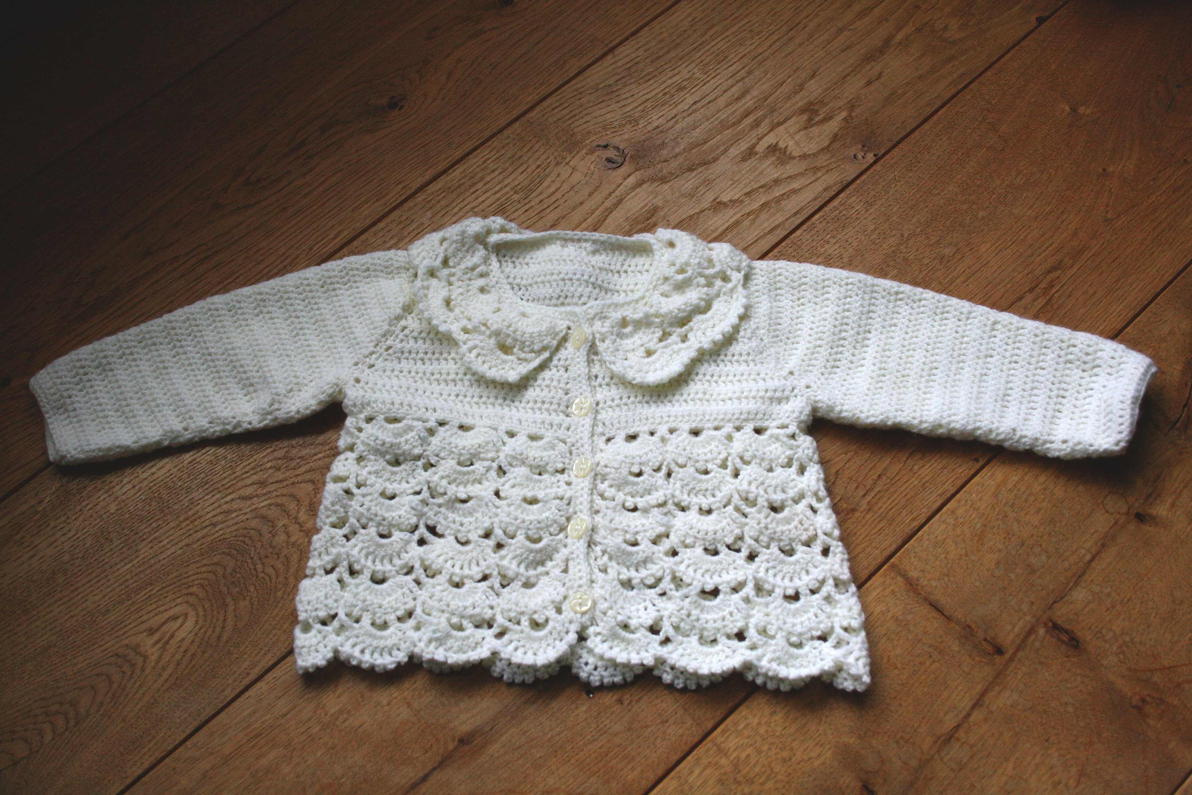 Collared lace baby cardigan