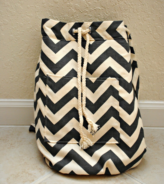 Drawstring backpack with a front pocket