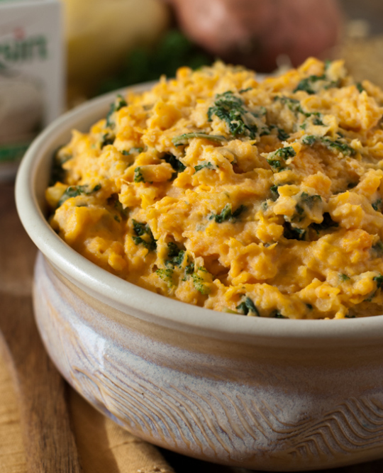 Mashed sweet potato with kale and boursin cheese