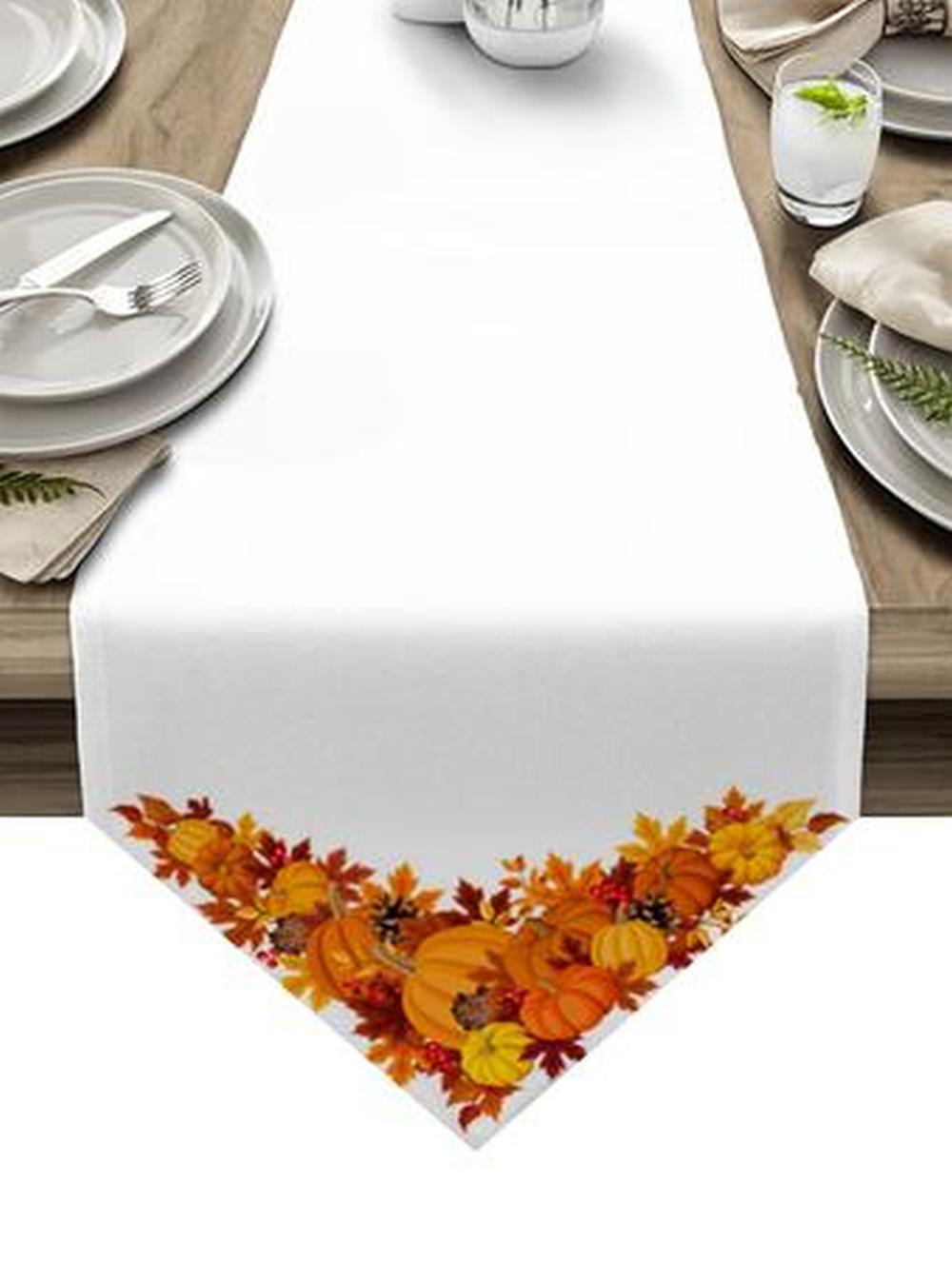 White table runner with maple leaves 