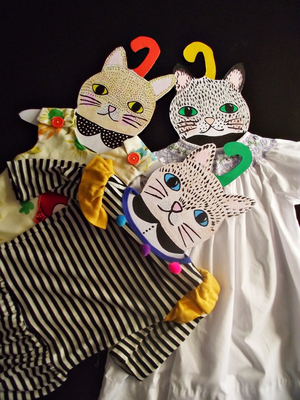 Cardboard cat clothing hangers