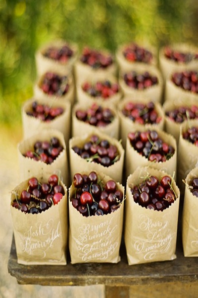 cherry wedding favors in brown bags