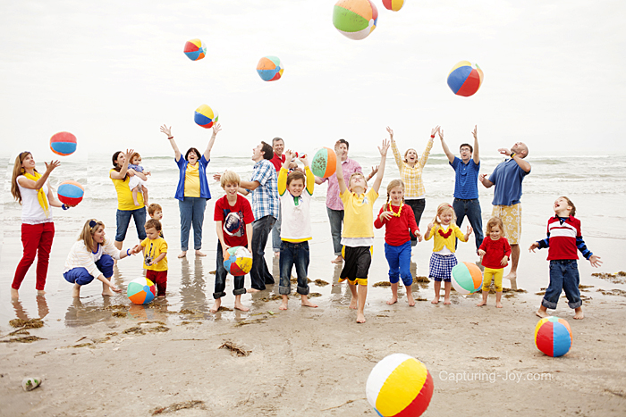 Beach Family Photoshoot with Lots of Beach Balls