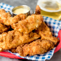 Juicy chicken tenders with a delicious crispy coating - serve with this sweet honey mustard dip for a seriously addicting treat!
