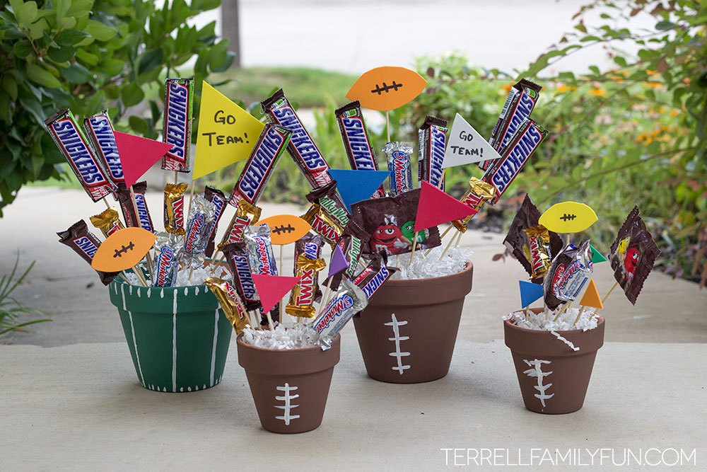 Attaching sticks to chocolate bars  Candy bouquet, Homemade birthday  gifts, Candy bar bouquet