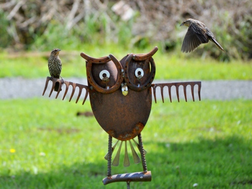 Rake, spade, and horseshow owl yard art