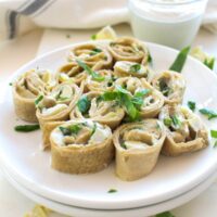 Spinach artichoke pinwheels roll and serve
