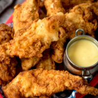 Cropped buttermilk chicken tenders with honey mustard finished tall jpg