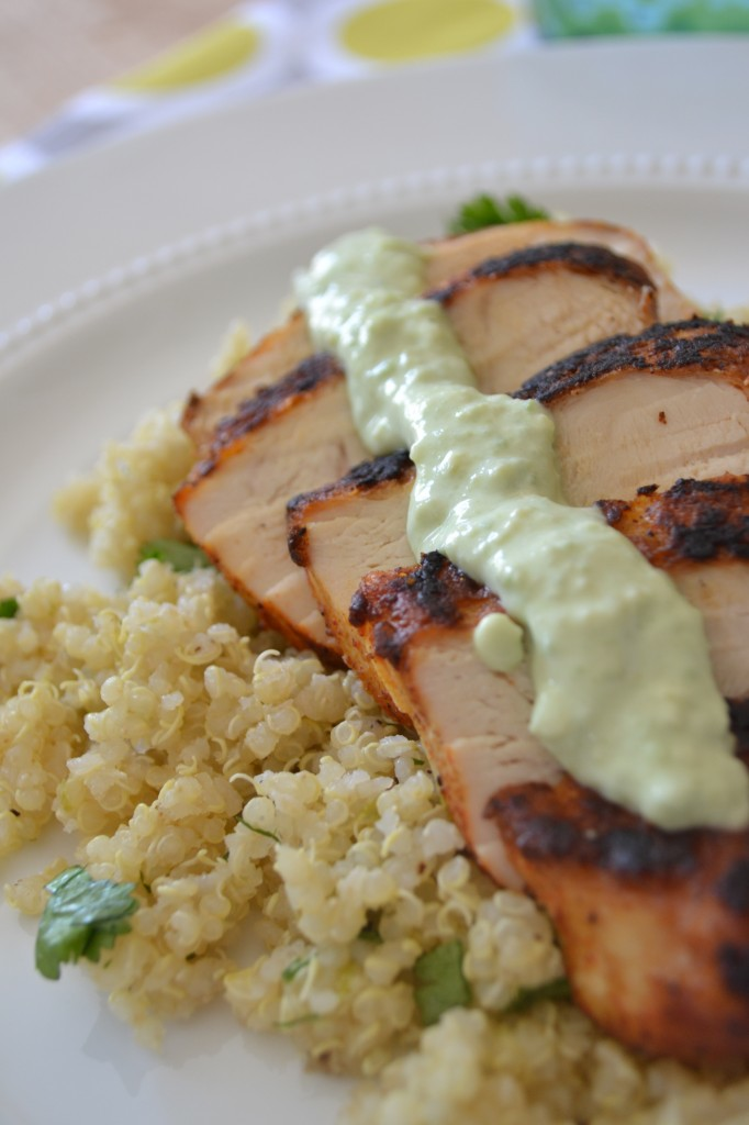 Blackened chicken breast over cilantro lime quinoa with greek yogurt avocado puree