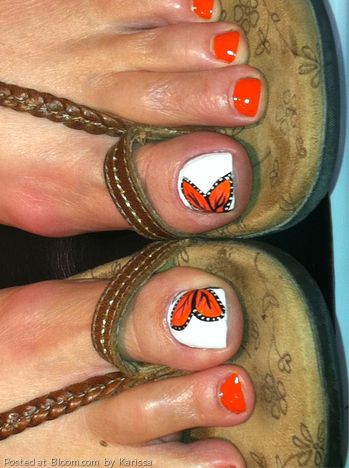 Orange butterfly nail design
