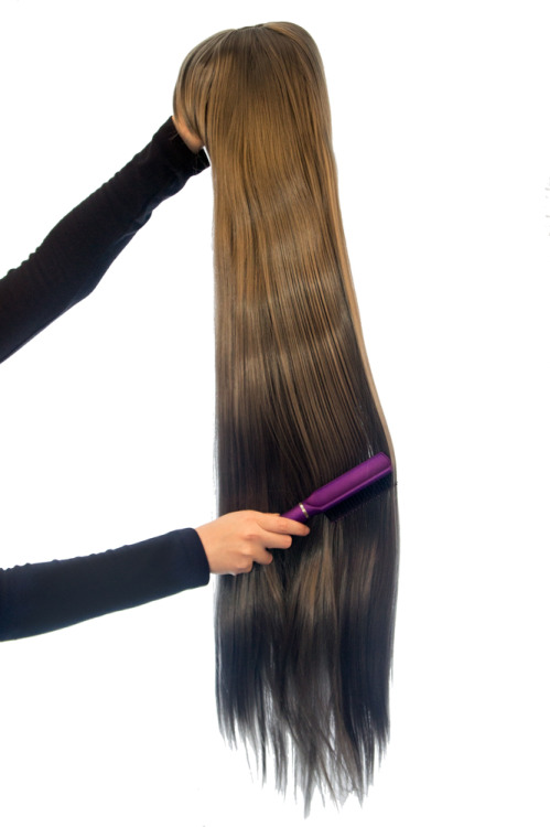 Image result for brushing a wig