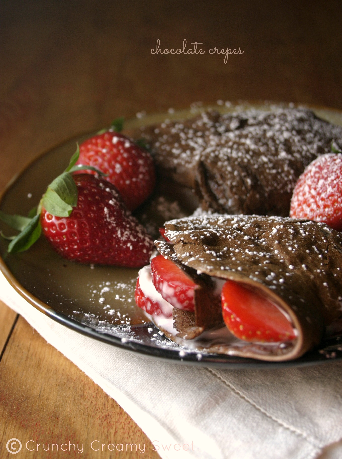 Chocolate crepes strawberries and cream filling