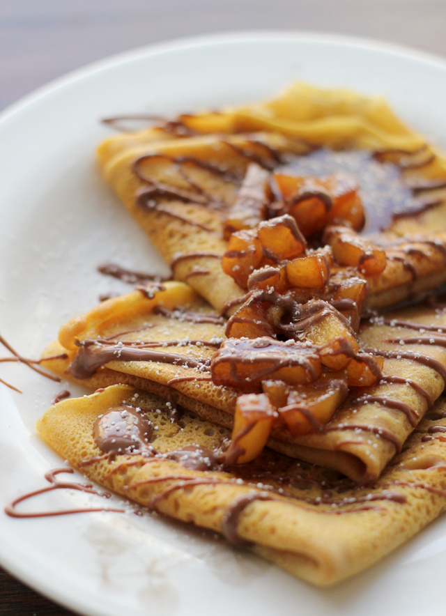 Pumpkin crepes with beer and cinnamon apples and a chocolate drizzle