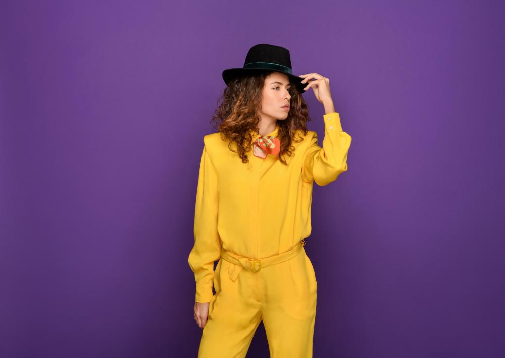 Bright yellow tracksuit with fedora hat 80s costumes women