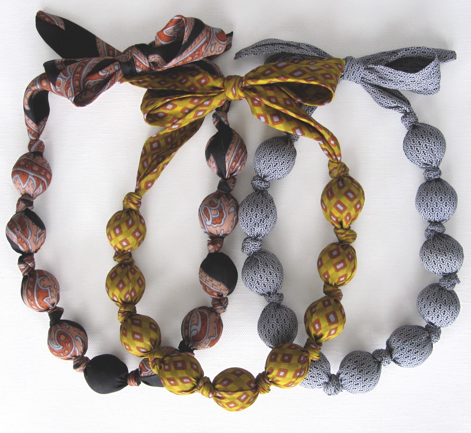 Tie covered beaded necklace
